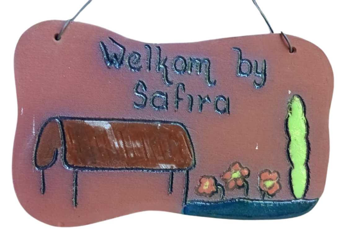 The original handmade Welkom by Safira sign from the Hoopstad nursery